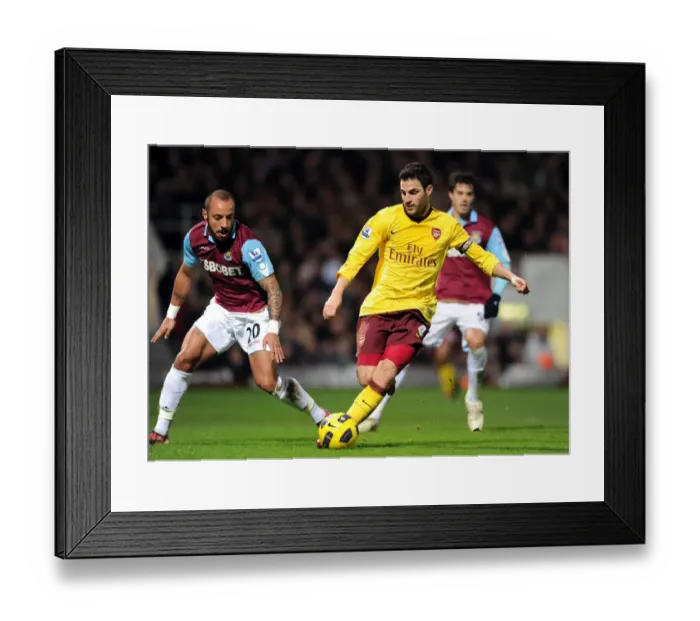 Framed Print : Cesc Fabregas (Arsenal) Julien Faubert (West Ham). West Ham United 0: 3 Arsenal