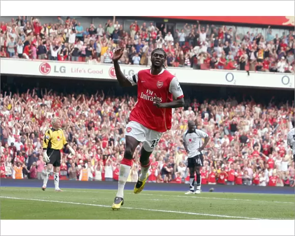 Emmauel Adebayor celebrates scoring Arsenals 2nd goal
