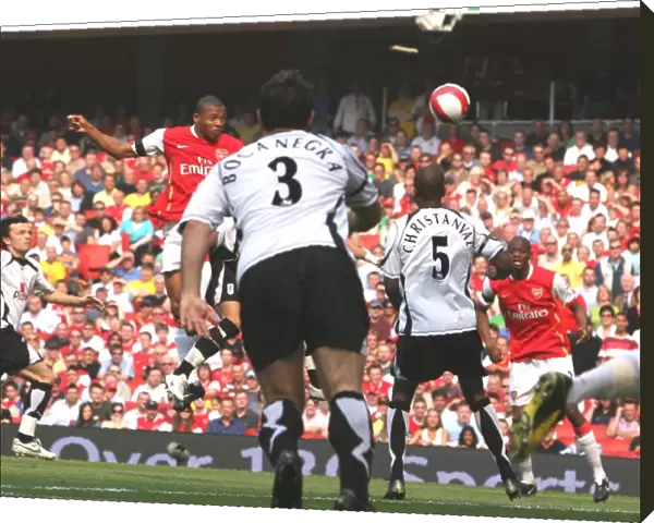 Julio Baptista heads over Philippe Christanval to score the 1st Arsenal goal