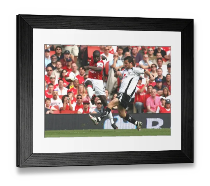 Framed Print : Emmanuel Eboue (Arsenal) Tomaz Radzinski (Fulham) Framed Print : Emmanuel Eboue (Arsenal) Tomaz Radzinski (Fulham)