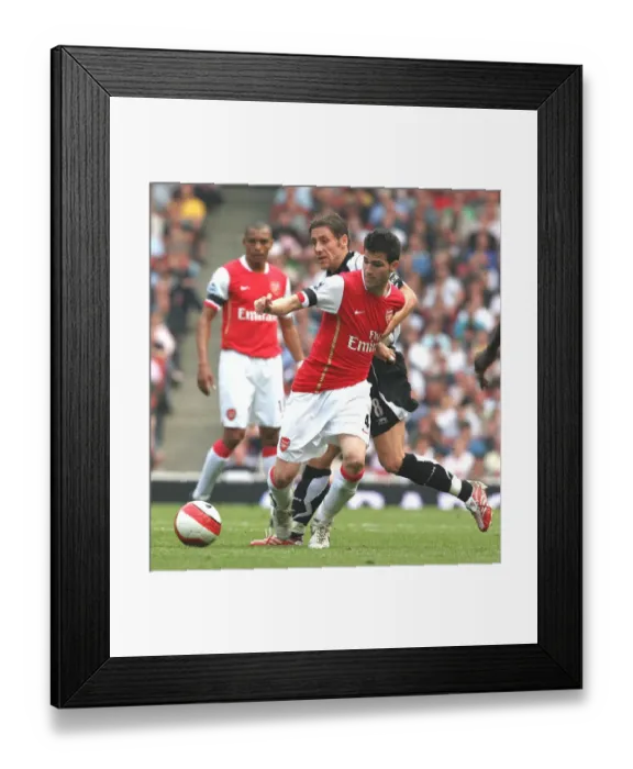 Framed Print : Cesc Fabregas (Arsenal) Michael Brown (Fulham) Framed Print : Cesc Fabregas (Arsenal) Michael Brown (Fulham)