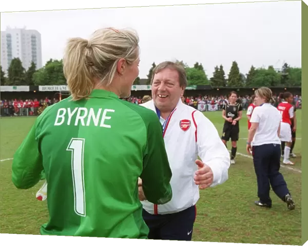 Emma Byrne (Arsenal) and Vic Akers Arsenal Manager celebrate at the end of the match