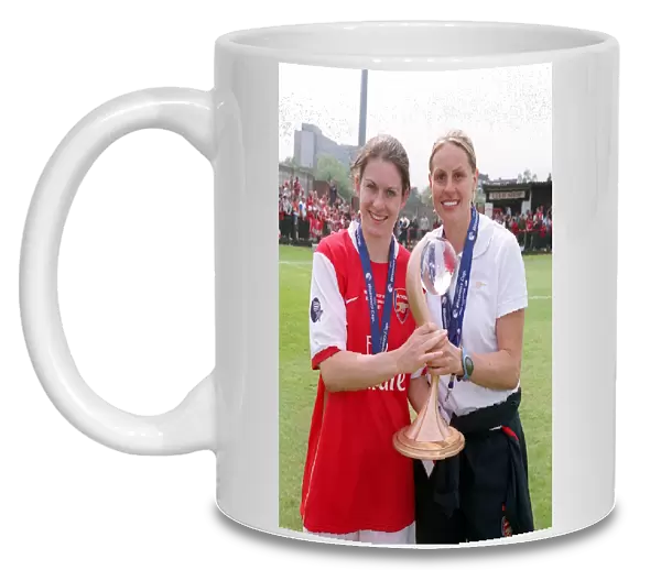 Kelly Smith and Karen Carney (Arsenal) with the European Trophy