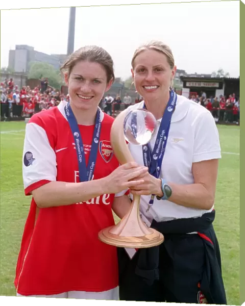 Kelly Smith and Karen Carney (Arsenal) with the European Trophy
