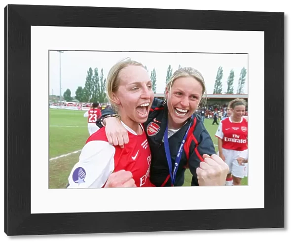 Faye White and Kelly Smith (Arsenal) celebrate at the end of the match