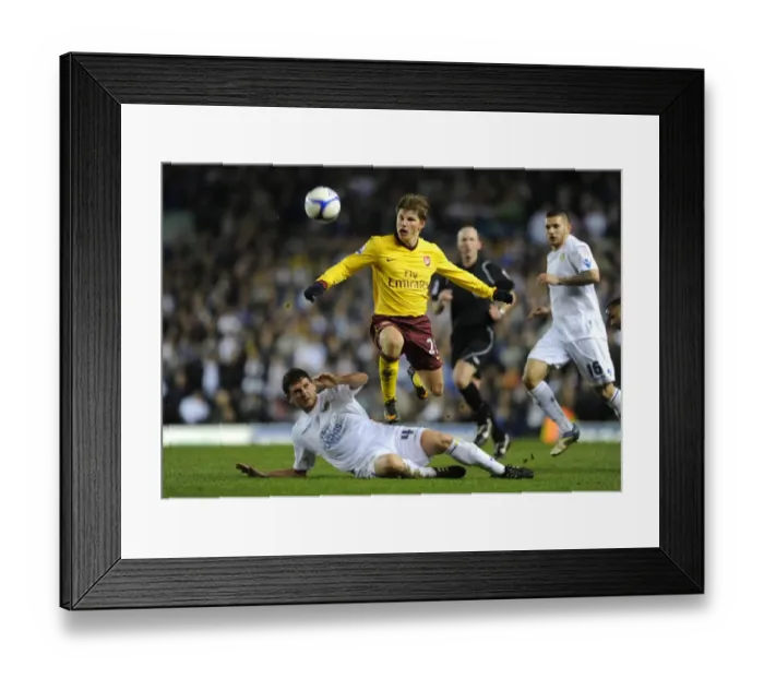 Framed Print : Andrey Arshavin (Arsenal) Alex Bruce (Leeds). Leeds United 1: 3 Arsenal