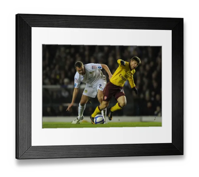 Framed Print : Andrey Arshavin (Arsenal) Paul Connolly (Leeds). Leeds United 1: 3 Arsenal Framed Print : Andrey Arshavin (Arsenal) Paul Connolly (Leeds). Leeds United 1: 3 Arsenal