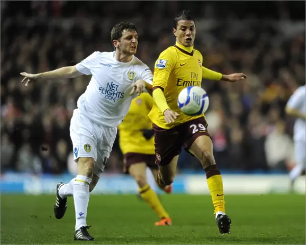 Marouane Chamakh (Arsenal) Alex Bruce (Leeds). Leeds United 1: 3 Arsenal