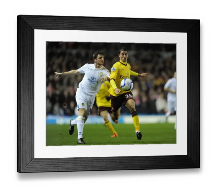 Framed Print : Marouane Chamakh (Arsenal) Alex Bruce (Leeds). Leeds United 1: 3 Arsenal Framed Print : Marouane Chamakh (Arsenal) Alex Bruce (Leeds). Leeds United 1: 3 Arsenal