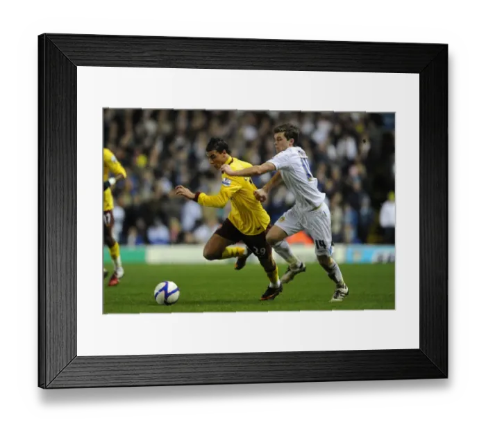Framed Print : Marouane Chamakh (Arsenal) Jonathan Howson (Leeds). Leeds United 1: 3 Arsenal Framed Print : Marouane Chamakh (Arsenal) Jonathan Howson (Leeds). Leeds United 1: 3 Arsenal