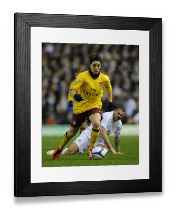 Framed Print : Samir Nasri's Brilliant Performance: Arsenal Crushes Leeds United 3-1 in FA Cup 3rd Round Replay