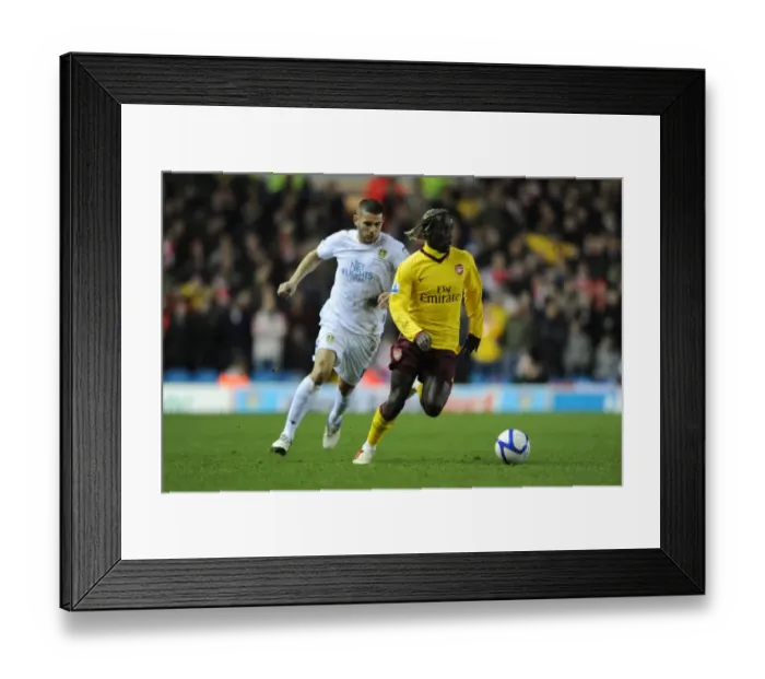 Framed Print : Bacary Sagna (Arsenal) Bradley Johnson (Leeds). Leeds United 1: 3 Arsenal