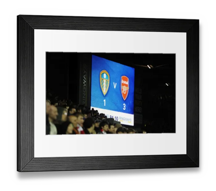 Framed Print : The scoreboard at Elland Road shows the final score. Leeds United 1: 3 Arsenal Framed Print : The scoreboard at Elland Road shows the final score. Leeds United 1: 3 Arsenal