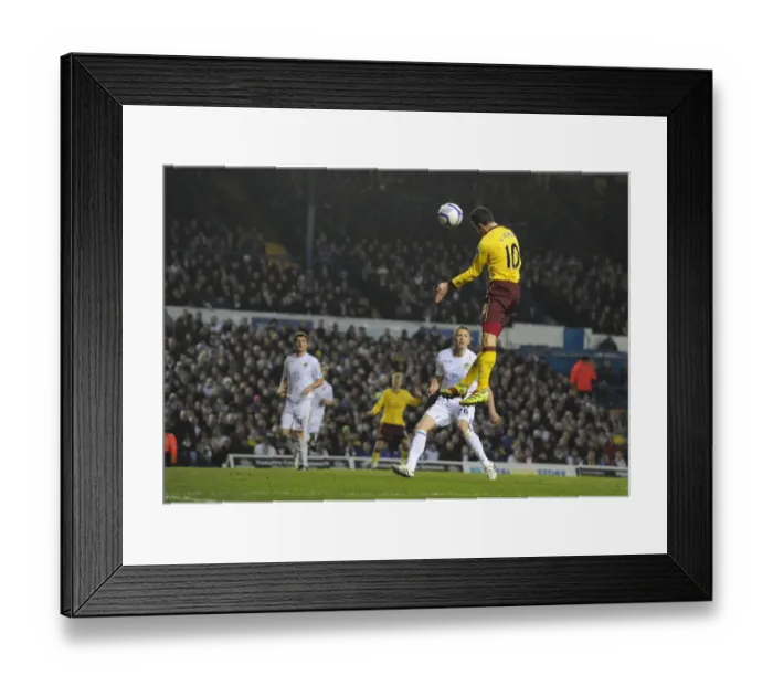 Framed Print : Robin van Persie heads past Leeds goalkeeper Kasper Schmeichel to score the 3rd Arsenal goal Framed Print : Robin van Persie heads past Leeds goalkeeper Kasper Schmeichel to score the 3rd Arsenal goal