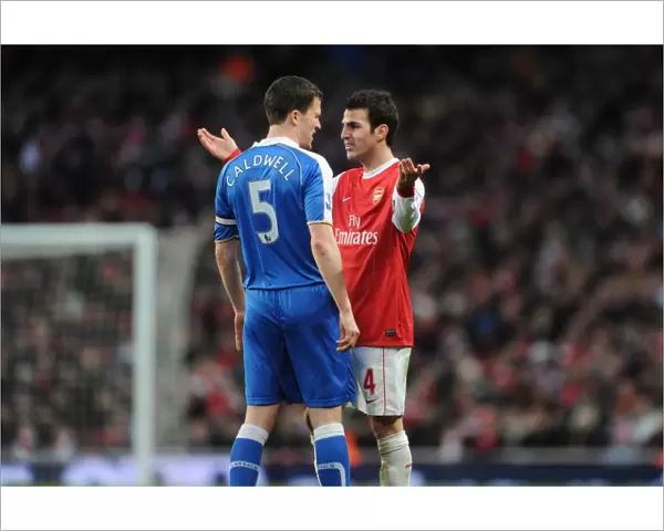 Cesc Fabregas (Arsenal) Gary Caldwell (Wigan). Arsenal 3: 0 Wigan Athletic
