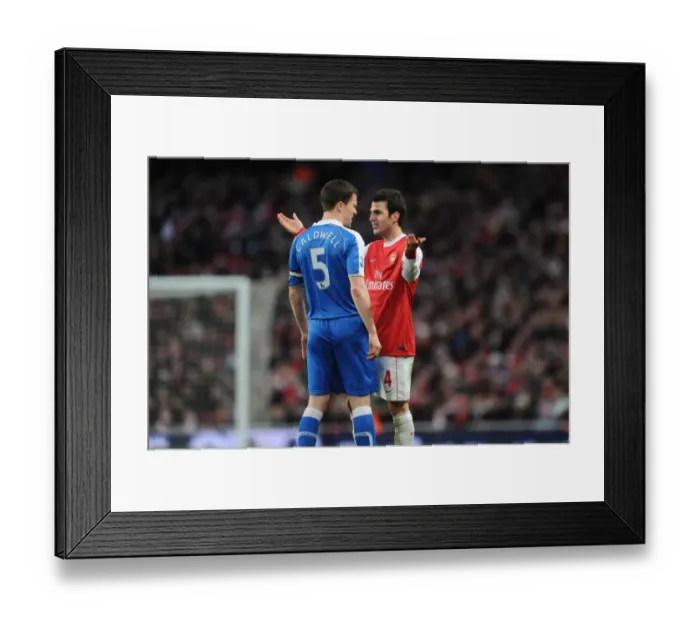 Framed Print : Cesc Fabregas (Arsenal) Gary Caldwell (Wigan). Arsenal 3: 0 Wigan Athletic Framed Print : Cesc Fabregas (Arsenal) Gary Caldwell (Wigan). Arsenal 3: 0 Wigan Athletic