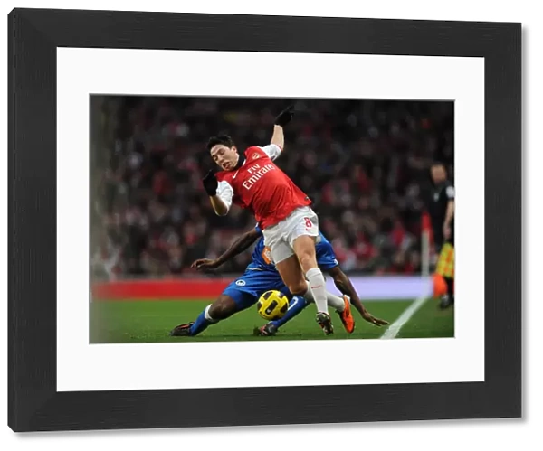 Samir Nasri (Arsenal) Steve Gohouri (Wigan). Arsenal 3: 0 Wigan Athletic