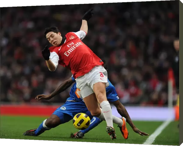 Samir Nasri (Arsenal) Steve Gohouri (Wigan). Arsenal 3: 0 Wigan Athletic