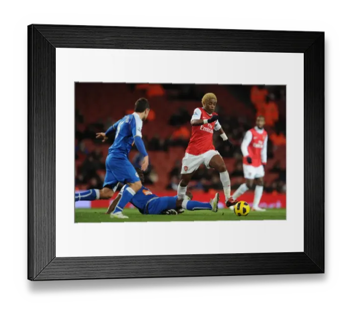 Framed Print : Alex Song (Arsenal) James McCarthur (Wigan). Arsenal 3: 0 Wigan Athletic
