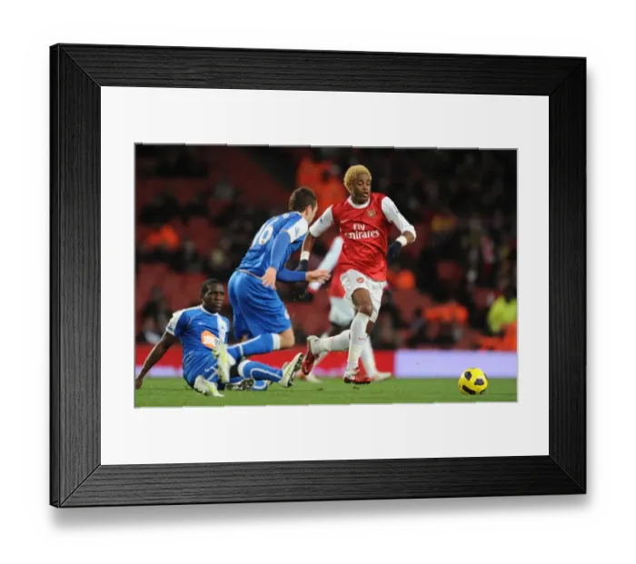 Framed Print : Alex Song (Arsenal) James McCarthur and Hendry Thomas(Wigan). Arsenal 3: 0 Wigan Athletic