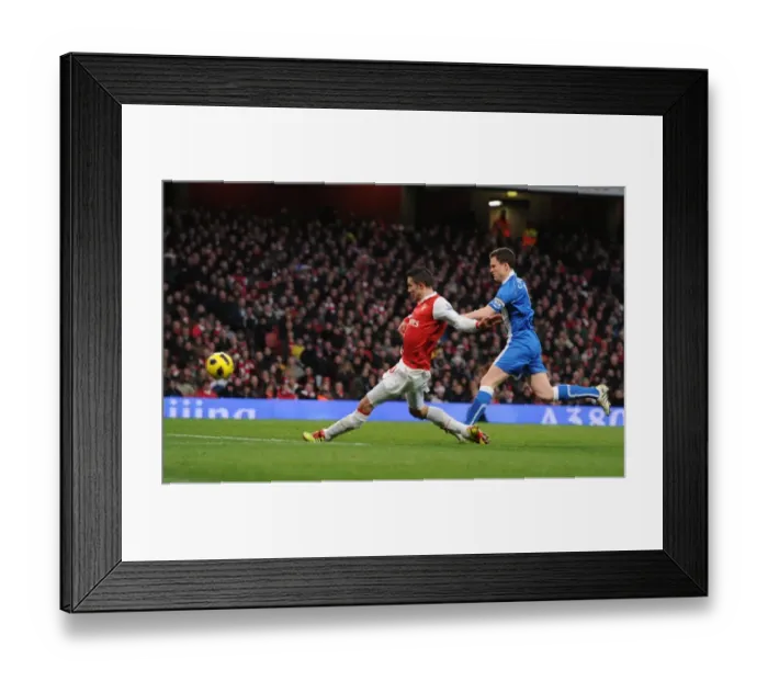 Framed Print : Robin van Persie Scores Stunner: Arsenal Crush Wigan 3-0 Framed Print : Robin van Persie Scores Stunner: Arsenal Crush Wigan 3-0
