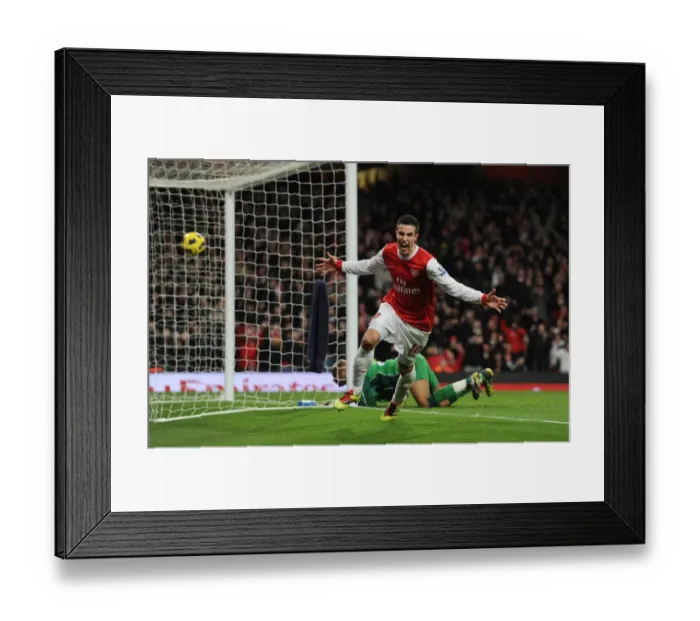 Framed Print : Robin van Persie celebrates scoring the 3rd Arsenal goal. Arsenal 3: 0 Wigan Athletic