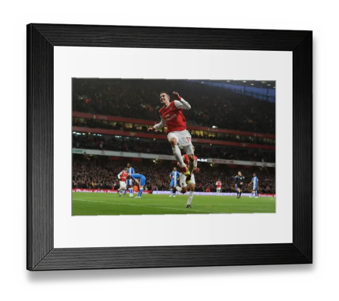Framed Print : Robin van Persie's Triumph: Arsenal's 3rd Goal vs Wigan Athletic in the Premier League