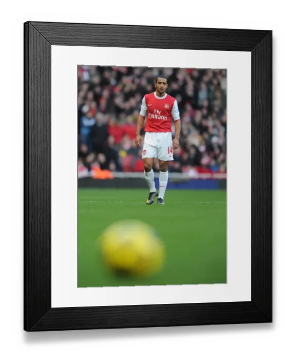 Framed Print : Theo Walcott's Brace: Arsenal Crushes Wigan Athletic 3-0 in Premier League Framed Print : Theo Walcott's Brace: Arsenal Crushes Wigan Athletic 3-0 in Premier League