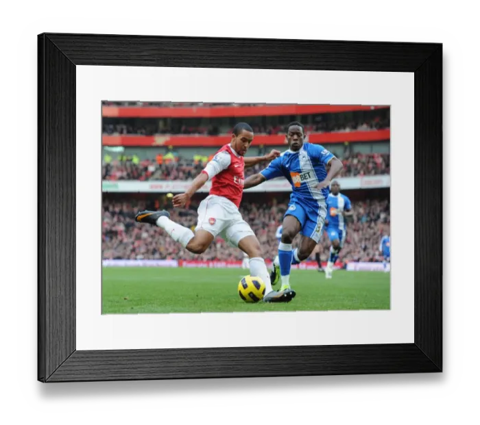 Framed Print : Theo Walcott (Arsenal) Maynor Figueroa (Wigan). Arsenal 3: 0 Wigan Athletic