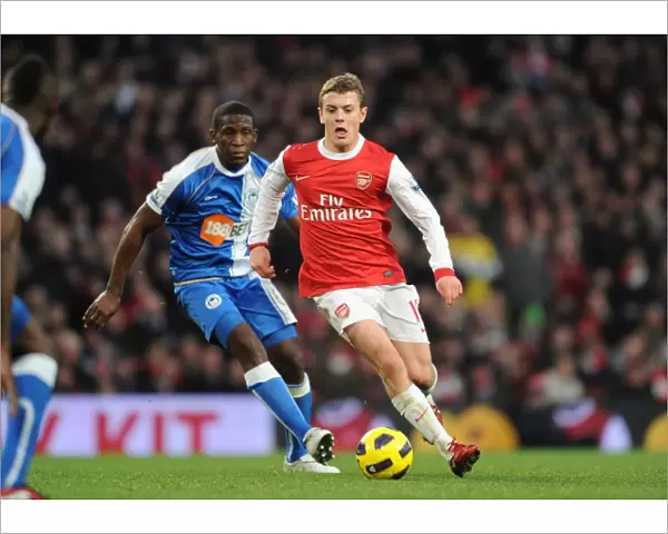 Jack Wilshere (Arsenal) Hendry Thomas (Wigan). Arsenal 3: 0 Wigan Athletic