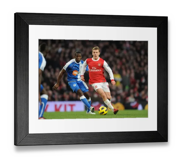 Framed Print : Jack Wilshere (Arsenal) Hendry Thomas (Wigan). Arsenal 3: 0 Wigan Athletic Framed Print : Jack Wilshere (Arsenal) Hendry Thomas (Wigan). Arsenal 3: 0 Wigan Athletic