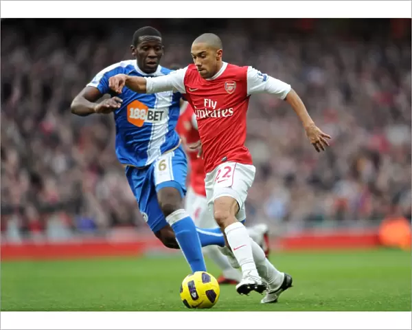 Gael Clichy (Arsenal) Hendry Thomas (Wigan). Arsenal 3: 0 Wigan Athletic