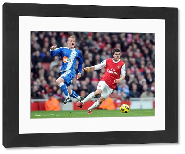 Cesc Fabregas (Arsenal) Ben Watson (Wigan). Arsenal 3: 0 Wigan Athletic