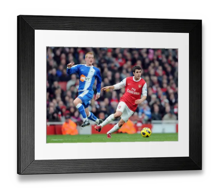 Framed Print : Cesc Fabregas (Arsenal) Ben Watson (Wigan). Arsenal 3: 0 Wigan Athletic