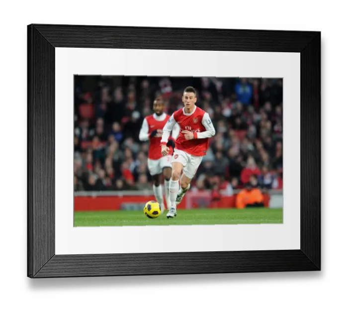 Framed Print : Laurent Koscielny (Arsenal). Arsenal 3: 0 Wigan Athletic. Barclays Premier League Framed Print : Laurent Koscielny (Arsenal). Arsenal 3: 0 Wigan Athletic. Barclays Premier League