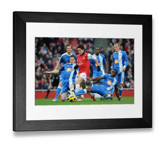 Framed Print : Arsenal Triumphs Over Wigan: Samir Nasri's Brilliant Performance Leads to a 3-0 Victory