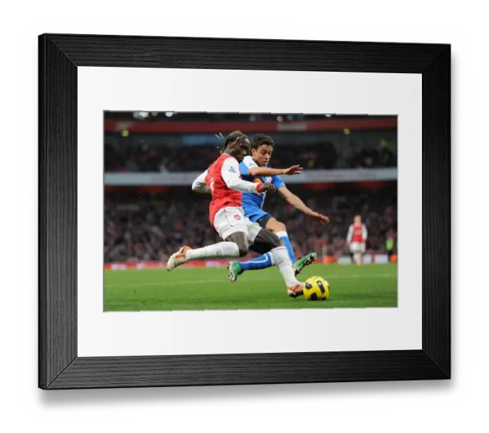 Framed Print : Bacary Sagna (Arsenal) Franco Di Santo (Wigan). Arsenal 3: 0 Wigan Athletic