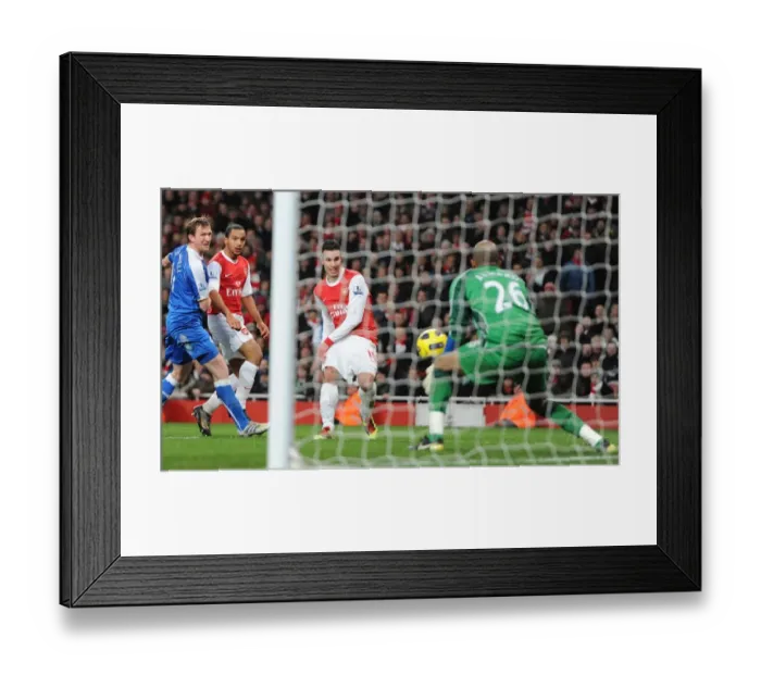 Framed Print : Robin van Persie scores his and Arsenals 3rd goal past Ali Al Habsi (Wigan) Framed Print : Robin van Persie scores his and Arsenals 3rd goal past Ali Al Habsi (Wigan)