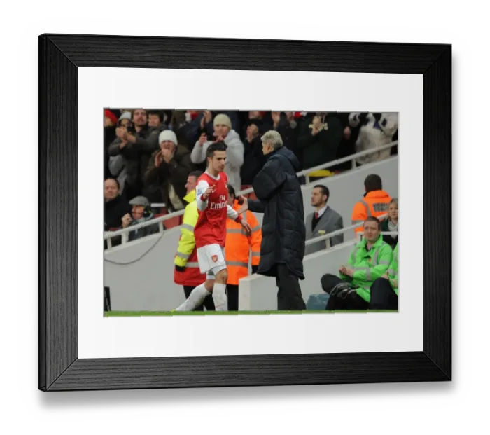 Framed Print : Robin van Persie (Arsenal) is congratulated by Manager Arsene Wenger on his hat trick as he is subbed. Arsenal 3: 0 Wigan Athletic. Barclays Premier League. Emirates Stadium, 22 / 1 / 11. Credit : Arsenal Football Club / Framed Print : Robin van Persie (Arsenal) is congratulated by Manager Arsene Wenger on his hat trick as he is subbed. Arsenal 3: 0 Wigan Athletic. Barclays Premier League. Emirates Stadium, 22 / 1 / 11. Credit : Arsenal Football Club /