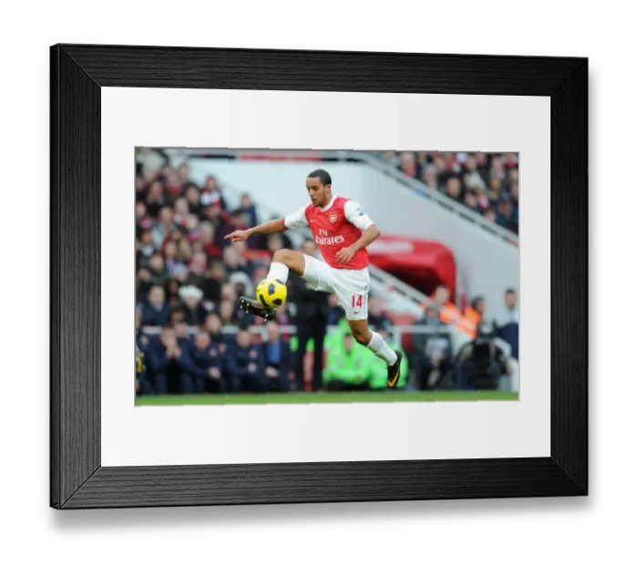 Framed Print : Theo Walcott's Brace: Arsenal's 3-0 Victory Over Wigan Athletic in the Premier League