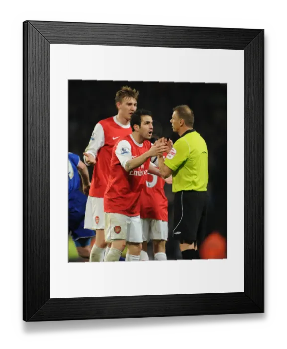 Framed Print : Cesc Fabregas and Nicklas Bendtner (Arsenal) with referee Mark Halsey. Arsenal 3