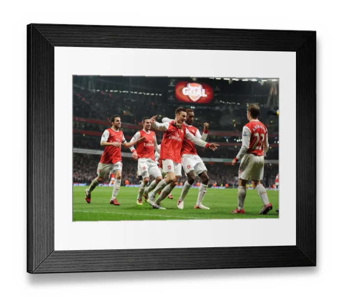 Framed Print : Arsenal's Koscielny and Teammates Celebrate Carling Cup Semi-Final Victory over Ipswich (3-0, 3-1 agg)