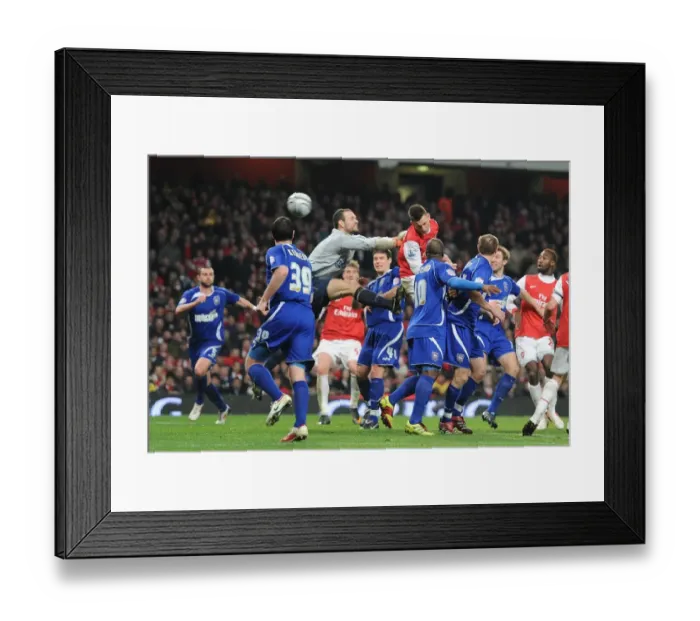 Framed Print : Laurent Koscielny heads past Ipswich goalkeeper Marton Gulop to score the 2nd Arsenal goal Framed Print : Laurent Koscielny heads past Ipswich goalkeeper Marton Gulop to score the 2nd Arsenal goal
