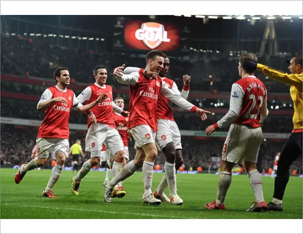 Arsenal's Winning Moment: Koscielny Scores the Second Goal with Djourou, Fabregas, van Persie, and Arshavin vs. Ipswich Town (3:0, 3:1 agg) in Carling Cup Semi Final at Emirates Stadium