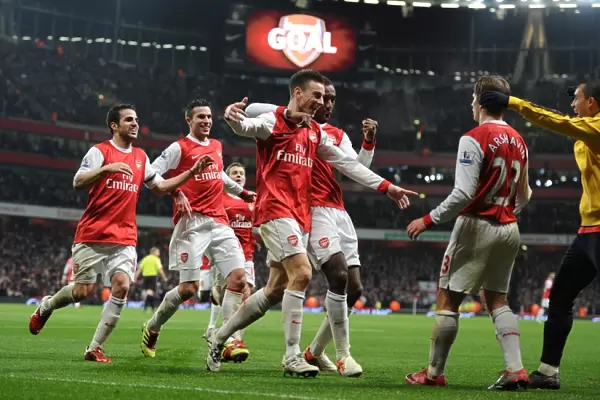 Arsenal's Winning Moment: Koscielny Scores the Second Goal with Djourou, Fabregas, van Persie, and Arshavin vs. Ipswich Town (3:0, 3:1 agg) in Carling Cup Semi Final at Emirates Stadium