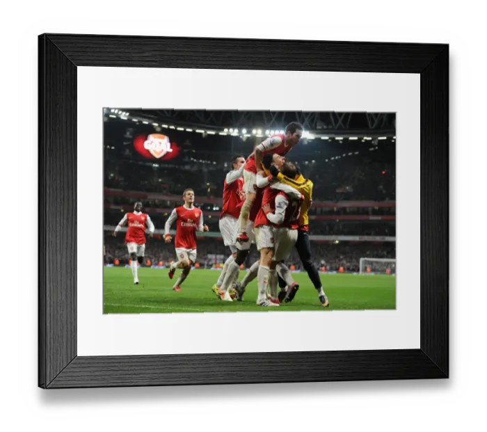 Framed Print : Arsenal's Koscielny and Teams Celebrate Carling Cup Semi-Final Goal Against Ipswich