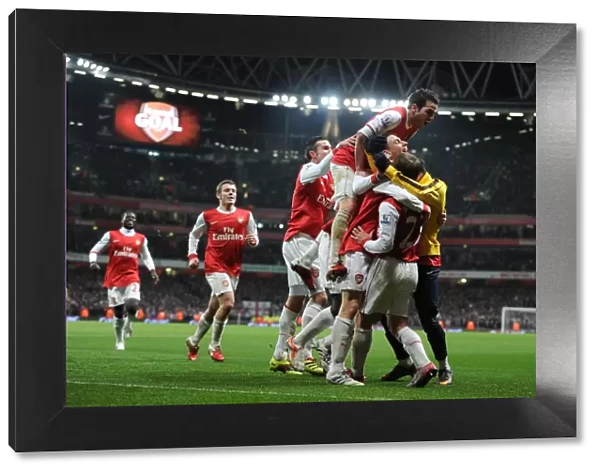 Laurent Koscielny celebrates scoring the 2nd Arsenal goal with Johan Djourou