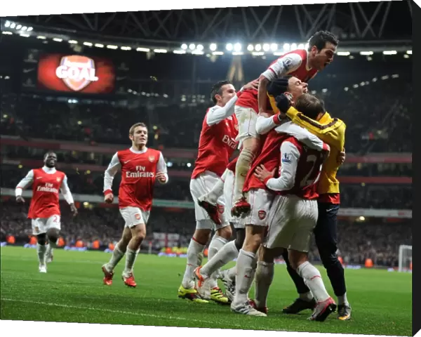 Laurent Koscielny celebrates scoring the 2nd Arsenal goal with Johan Djourou