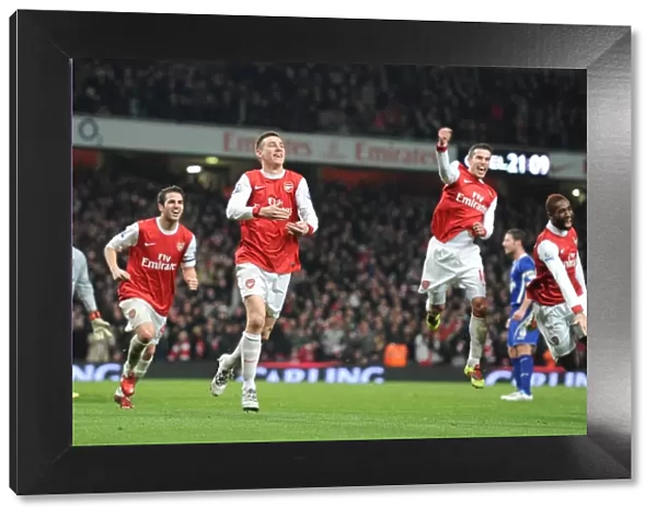Arsenal's Koscielny, Djourou, Fabregas, and van Persie Celebrate 2nd Goal in Carling Cup Semi-Final Victory over Ipswich Town (3:0, 3:1 agg)
