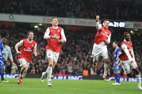 Arsenal's Koscielny, Djourou, Fabregas, and van Persie Celebrate 2nd Goal in Carling Cup Semi-Final Victory over Ipswich Town (3:0, 3:1 agg)